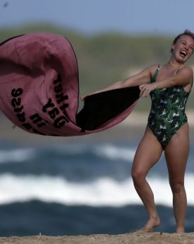 Jorgie porter enjoying sunny day at beach of hawaii