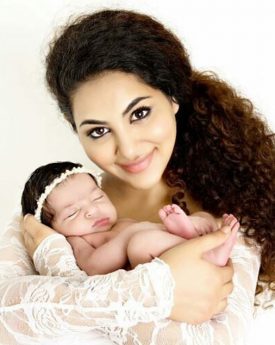 Annie khalid with her newly born daughter